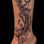 тату ноты на ноге - фото готовой татуировки от 02082016 5156 tatufoto.ru