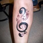тату ноты на ноге - фото готовой татуировки от 02082016 6157 tatufoto.ru