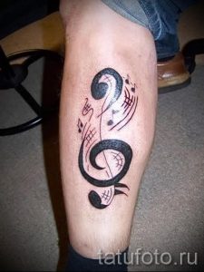тату ноты на ноге - фото готовой татуировки от 02082016 6157 tatufoto.ru