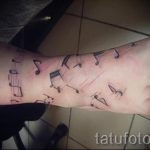 тату ноты на ноге - фото готовой татуировки от 02082016 7158 tatufoto.ru