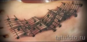 тату ноты на ноге - фото готовой татуировки от 02082016 8159 tatufoto.ru