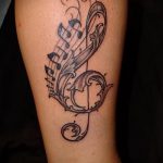 тату ноты на ноге - фото готовой татуировки от 02082016 9160 tatufoto.ru
