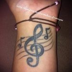 тату ноты на руке - фото готовой татуировки от 02082016 6171 tatufoto.ru