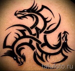 фото - тату трайбл дракон - пример для статьи про значение 3045 tatufoto.ru