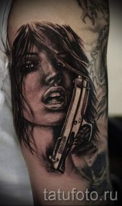 fille de tatouage avec une arme à feu - une photo du tatouage fini 01092016 2002 tatufoto.ru