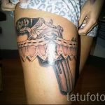tattoo garter with gun - photo of the finished tattoo 01092016 2038 tatufoto.ru