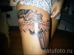 tattoo garter with gun - photo of the finished tattoo 01092016 2038 tatufoto.ru