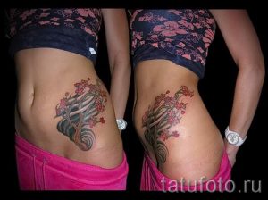 tattoo on the scar from appendicitis - Photo example of the finished tattoo 01092016 2007 tatufoto.ru