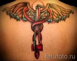 Тату Кадуцей фото - тату означающие удачу 3191 tatufoto.ru