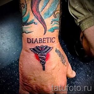 Тату Кадуцей фото - тату символизирующие счастье и удачу 4204 tatufoto.ru