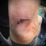 маленький пистолет тату - фото готовой татуировки 01092016 7069 tatufoto.ru