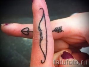 простые тату знаки - фото готовой татуировки 02092016 2223 tatufoto.ru