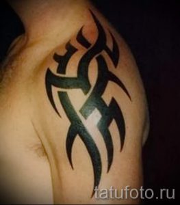 простые тату на плечо - фото готовой татуировки 02092016 5285 tatufoto.ru