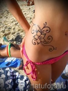 простые тату цветы - фото готовой татуировки 02092016 8350 tatufoto.ru