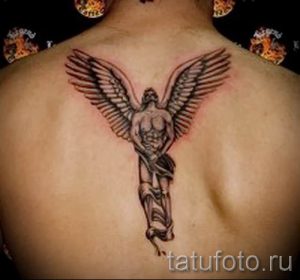 tatu-na-pozvonochnike-risunok-vdol-primer-foto-038-tatufoto-ru