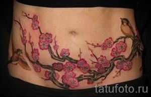 тату на шраме от аппендицита - фото пример готовой татуировки 01092016 16031 tatufoto.ru