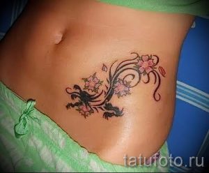 тату на шраме от аппендицита - фото пример готовой татуировки 01092016 9025 tatufoto.ru