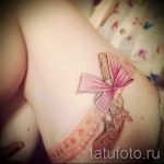 тату пистолет на ляшке - фото готовой татуировки 01092016 3105 tatufoto.ru