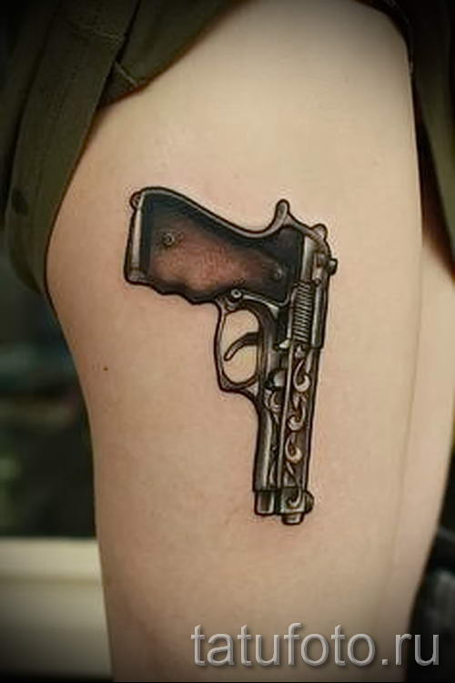 тату пистолет на ноге девушки - фото готовой татуировки 01092016 3116 tatufoto.ru