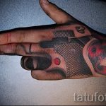 тату пистолет на руке - фото готовой татуировки 01092016 5129 tatufoto.ru