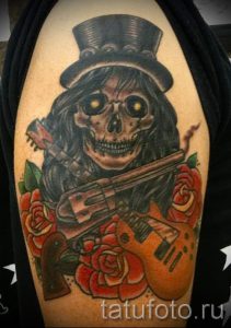 тату пистолет с розами - фото готовой татуировки 01092016 12145 tatufoto.ru
