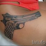 тату пистолет у девушек - фото готовой татуировки 01092016 12164 tatufoto.ru