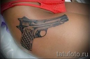 тату пистолет у девушек - фото готовой татуировки 01092016 12164 tatufoto.ru