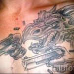 тату пистолеты на груди - фото готовой татуировки 01092016 12181 tatufoto.ru