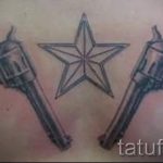 тату пистолеты на груди - фото готовой татуировки 01092016 13182 tatufoto.ru