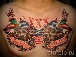 тату пистолеты на груди - фото готовой татуировки 01092016 15184 tatufoto.ru