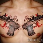 тату пистолеты на груди - фото готовой татуировки 01092016 17186 tatufoto.ru