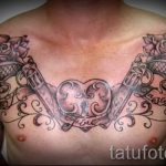 тату пистолеты на груди - фото готовой татуировки 01092016 5174 tatufoto.ru