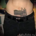 тату пистолеты на животе - фото готовой татуировки 01092016 4190 tatufoto.ru