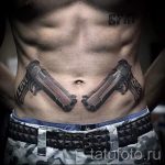 тату пистолеты на животе - фото готовой татуировки 01092016 6192 tatufoto.ru