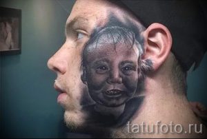 фото тату портрет - лицо ребенка - нанесена на лице папы