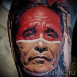 Фото тату портрет индейца - пол лица мужчины в красной краске