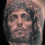 Тату икона Иисуса с красивыми глазами - фото