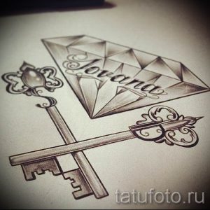 Эскиз татуировки с изображением бриллианта и надписью "Jovana". Персонализированный дизайн для памятной татуировки.