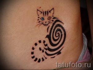 Фото тату Чеширский кот для статьи про значение рисунка татуировки - tatufoto.ru - 32