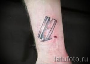 Фото тату лезвие - примеры для статьи про значение лезвия в тату - tatufoto.ru - 16