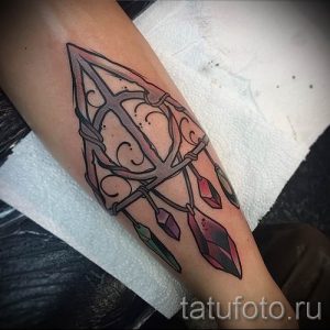 Фото тату тату дары смерти для статьи про значение рисунка татуировки - tatufoto.ru - 36