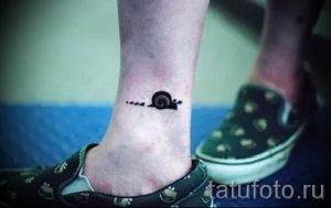 тату улитка фото - пример тату для статьи про значение татуировки - tatufoto.ru - 19