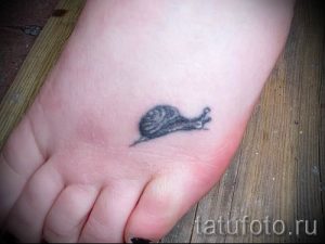 тату улитка фото - пример тату для статьи про значение татуировки - tatufoto.ru - 48