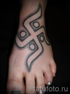 фото пример тату свастика для статьи про значение татуировки - tatufoto.ru - 14