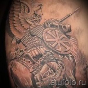 фото тату коловрат для статьи про значение татуировки коловрат - tatufoto.ru - 16