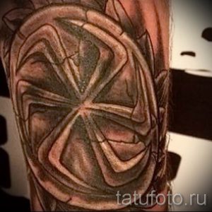 фото тату коловрат для статьи про значение татуировки коловрат - tatufoto.ru - 20