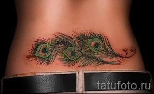 фото тату на пояснице для статьи про значение татуировок на пояснице - tatufoto.ru - 1