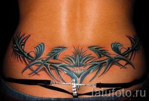 фото тату на пояснице для статьи про значение татуировок на пояснице - tatufoto.ru - 9