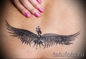 фото тату на пояснице для статьи про значение татуировок на пояснице - tatufoto.ru - 11