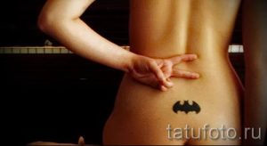 фото тату на пояснице для статьи про значение татуировок на пояснице - tatufoto.ru - 15